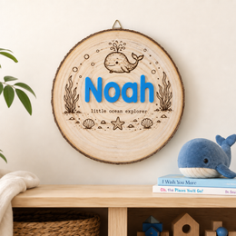 Personalized nursery name sign displayed in a child room setting
