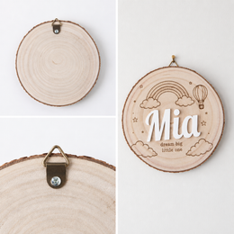 Back of personalized wood slice kids room sign showing the small hanging hook